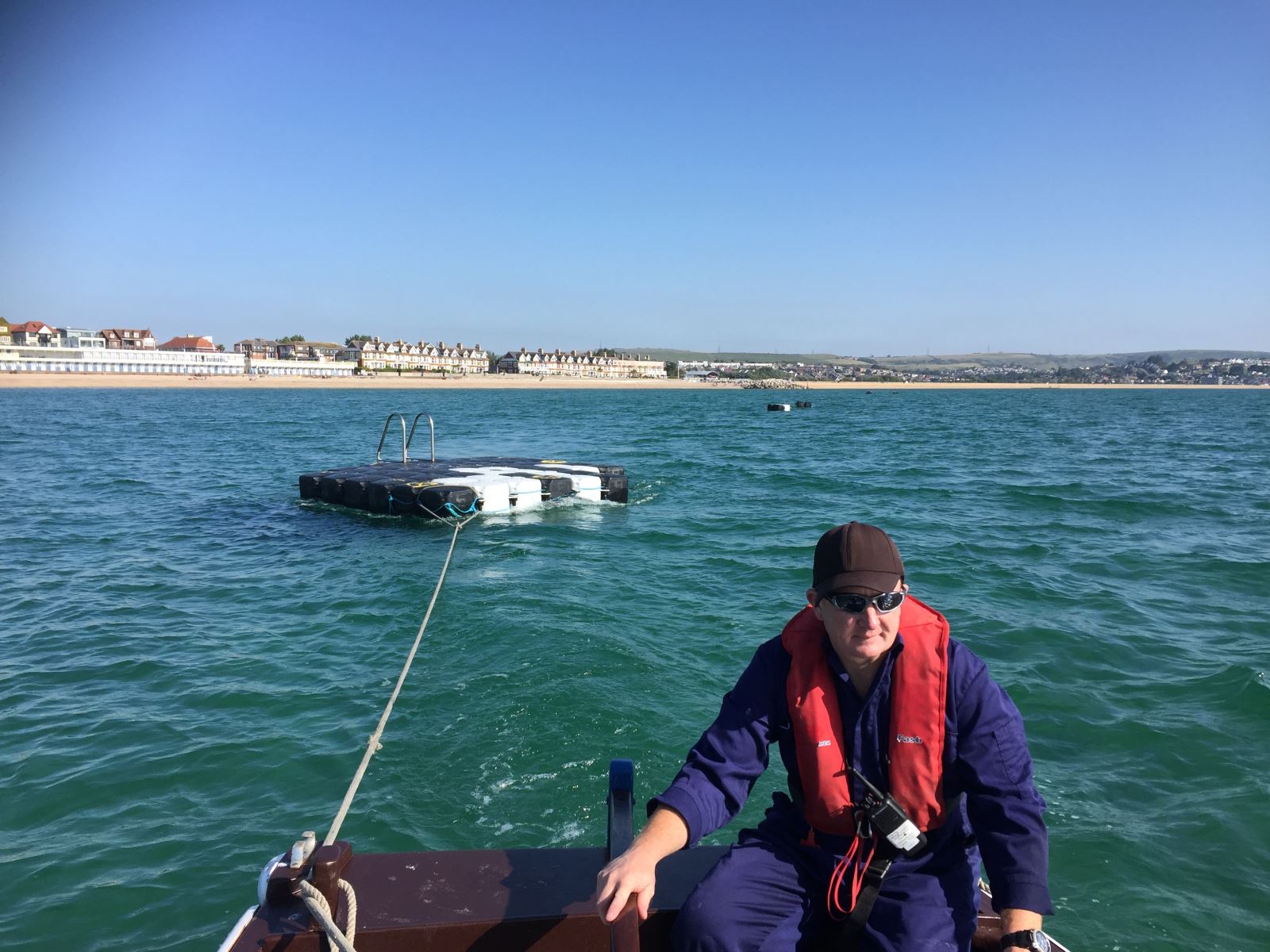 Swim Rafts being deployed by harbour staff